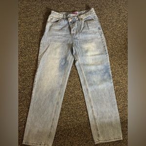 Cross over jean with button fly! Never been worn! No Tag!